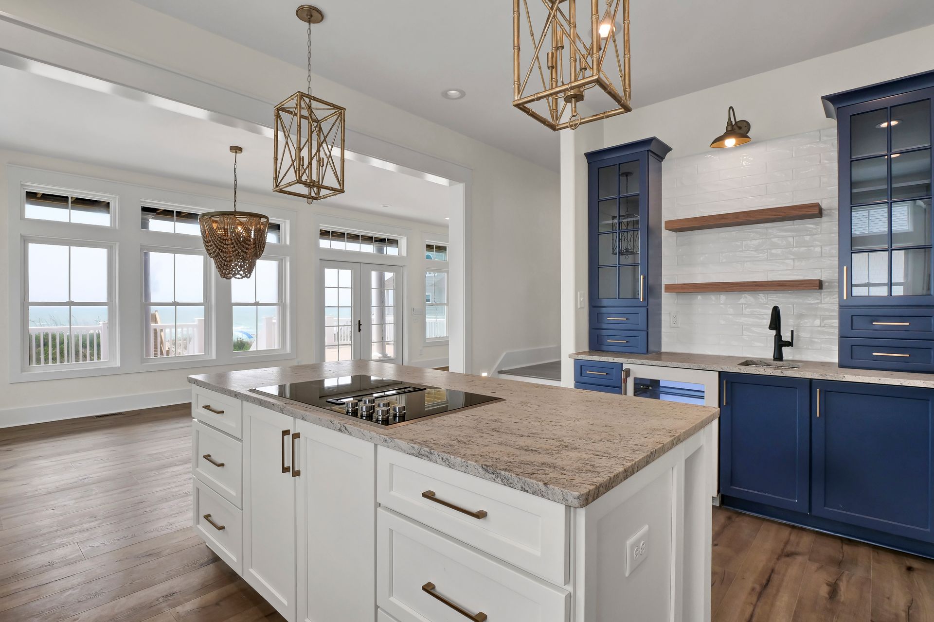 There is a large island in the middle of the kitchen.