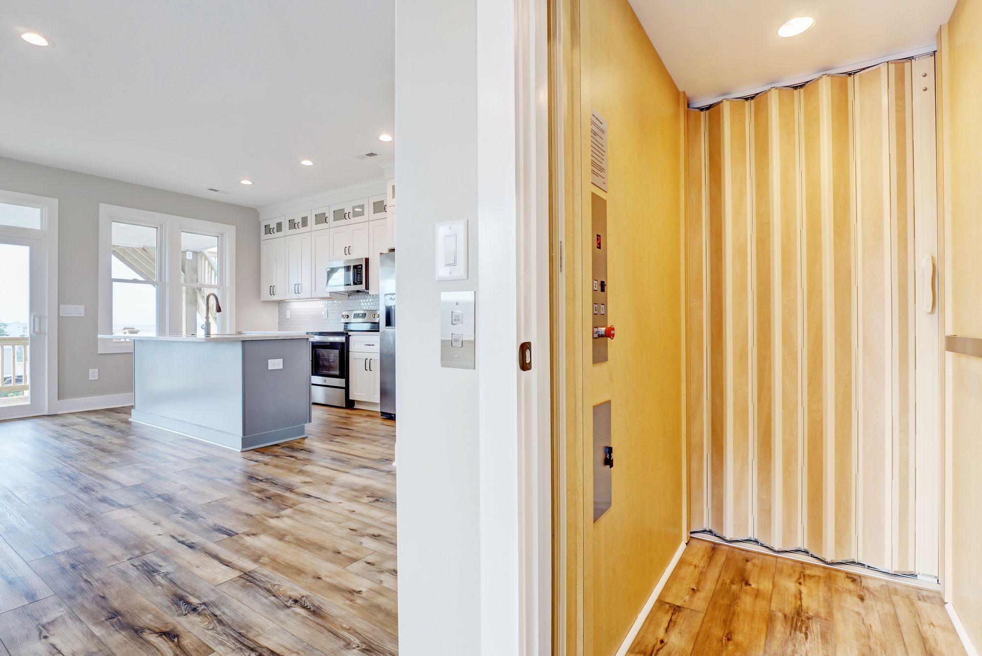 There is an elevator in the middle of the room.