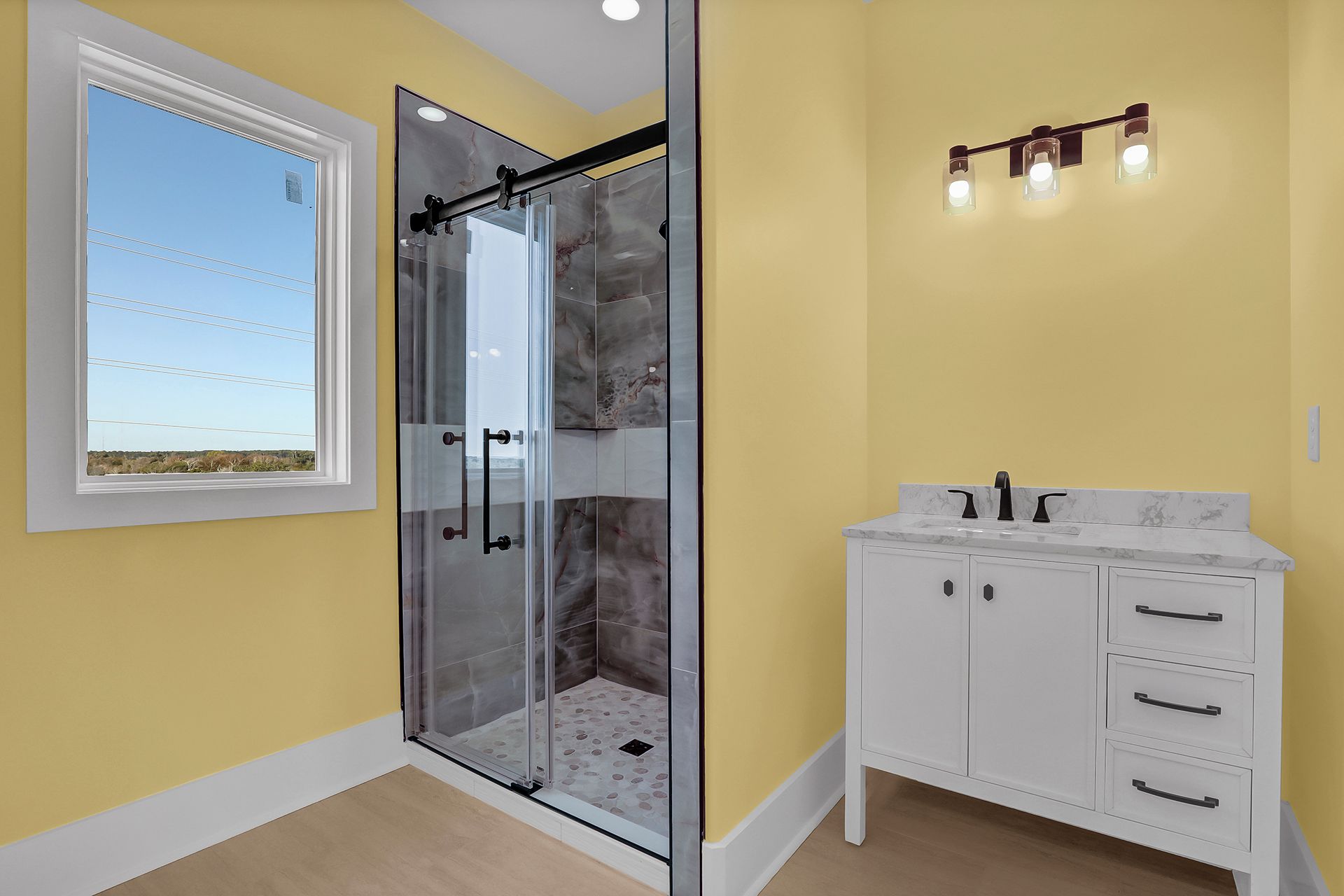 Walk-in shower with glass door