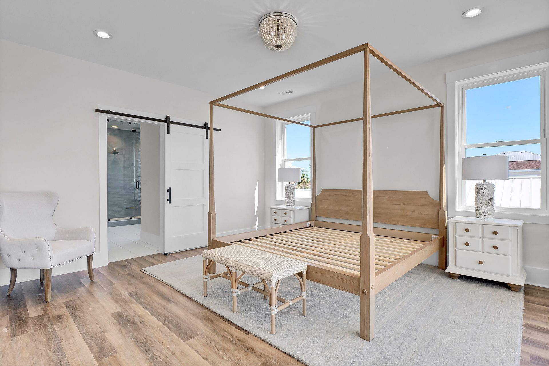 Canopy bed in the middle of the room