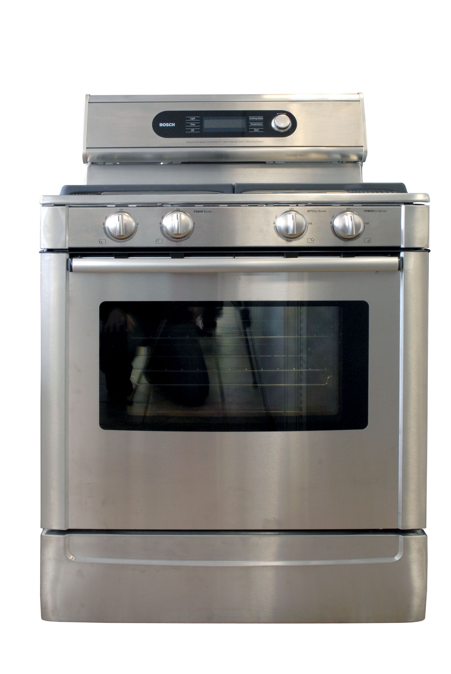 Stainless steel oven and stove, four burner cooktop, digital display, oven door.