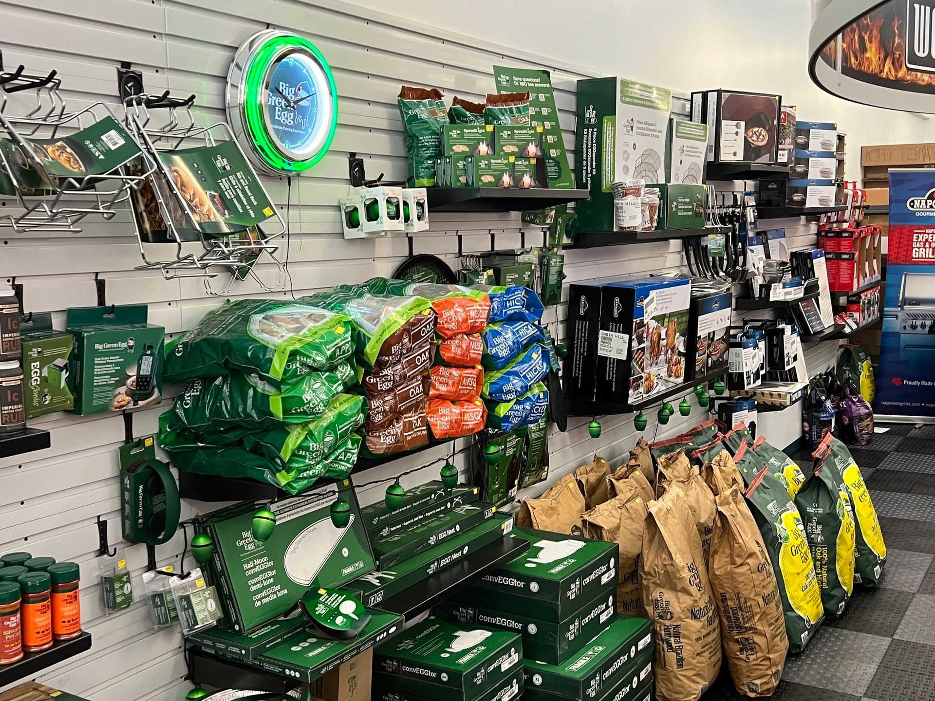 A store filled with lots of green bags and boxes.