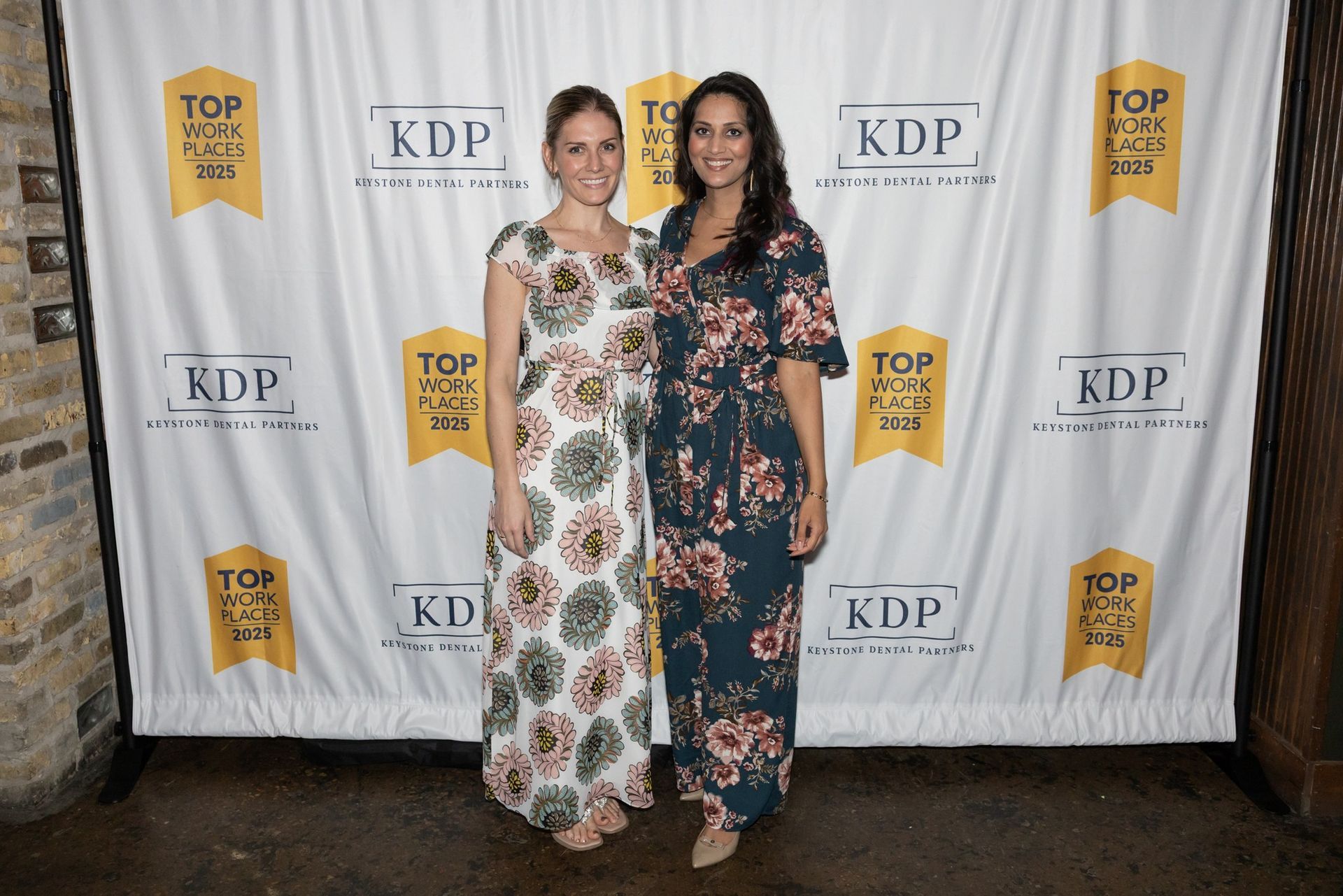 Two women are posing for a picture.