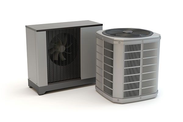 Two outdoor air conditioning units on a white background. One is rectangular, the other cylindrical.