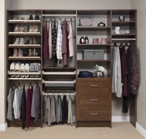 Dark brown closet organizer with shelves for shoes, hanging clothes, and drawers.
