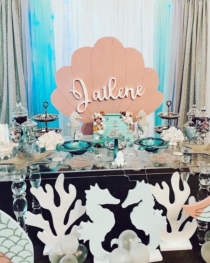 A table with a sign that says jalene on it.