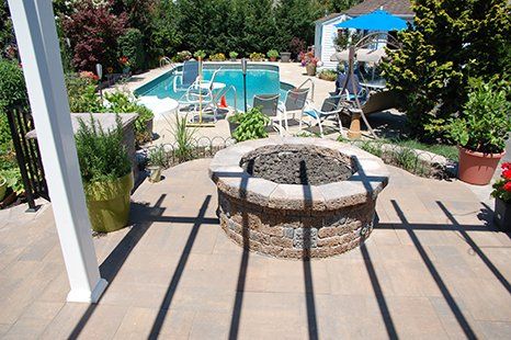 Fire pit with pool on the background