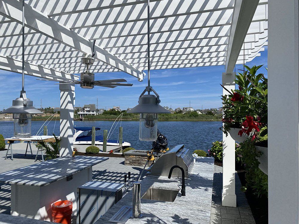 White pavilion with lake view