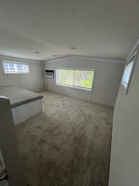 There is a bed in the middle of the room.