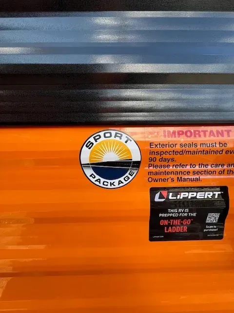 A close up of a sticker on the side of a vehicle.