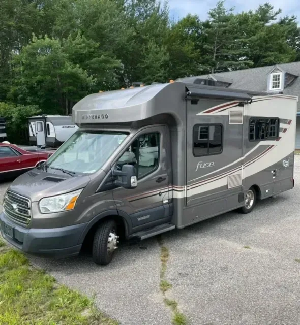 A rv with the word fiesta on the side