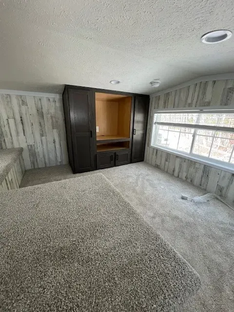 There is a large window in the middle of the room.