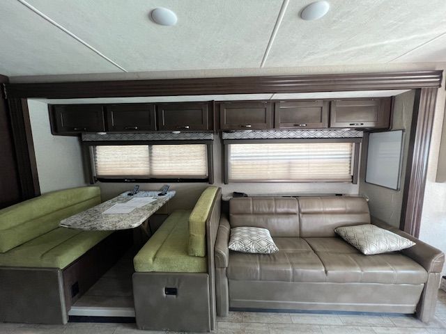 A living room with a couch and a table