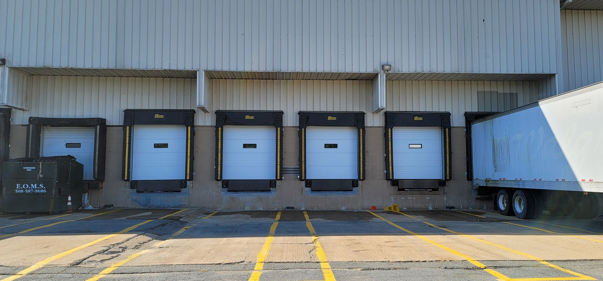 A row of loading docks on the side of a building.