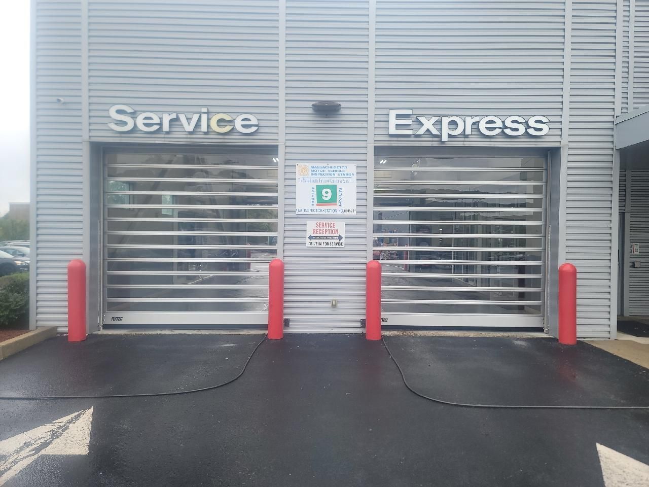 A service and express building with a sliding garage door