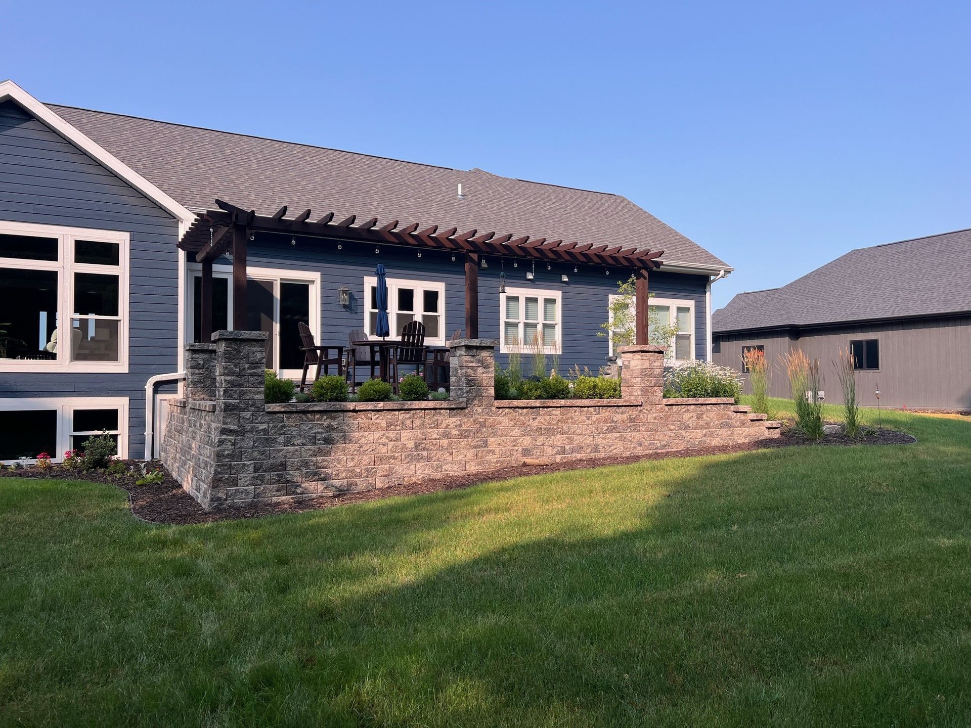 A large house with a large lawn in front of it