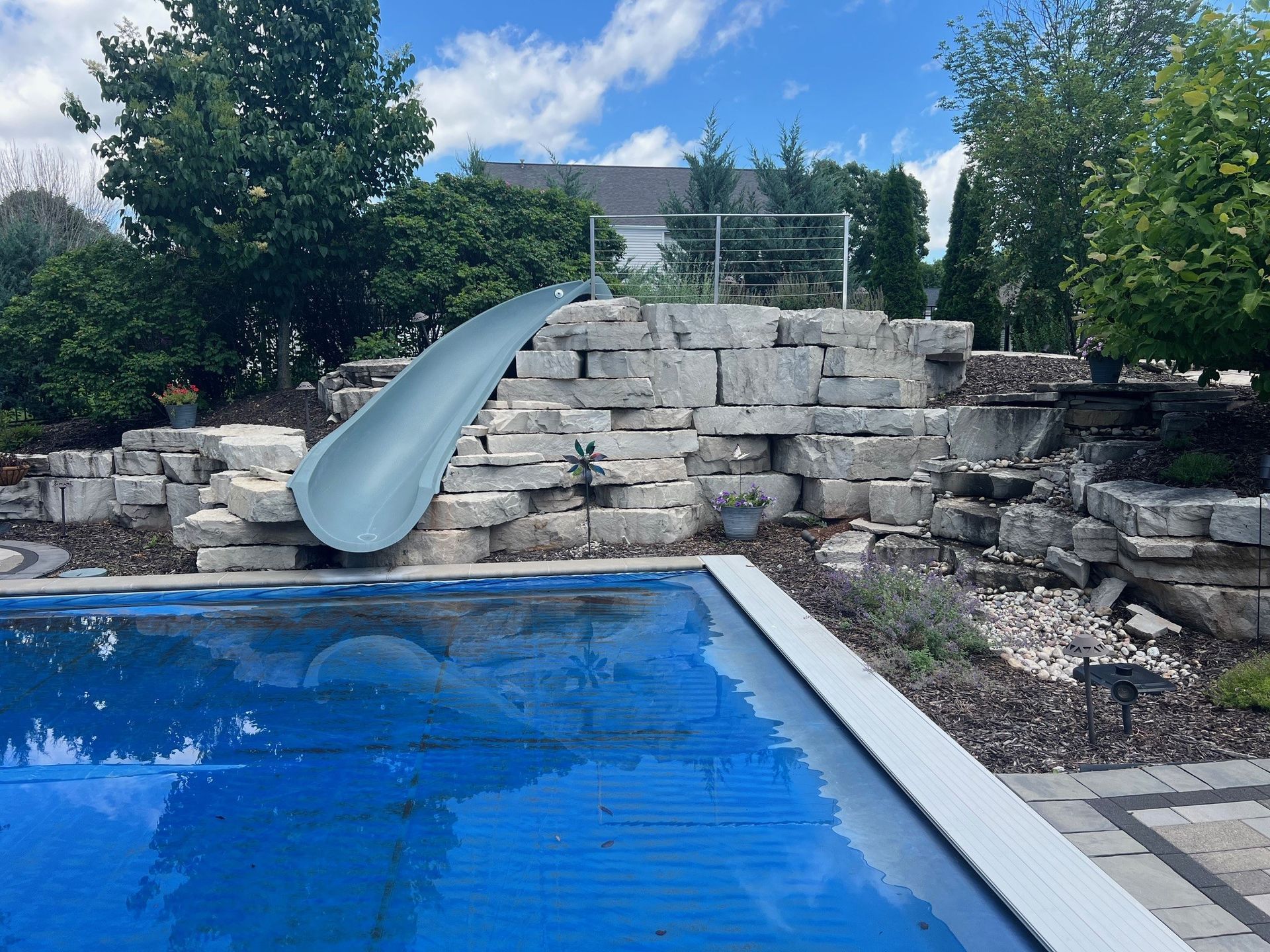 A swimming pool with a slide