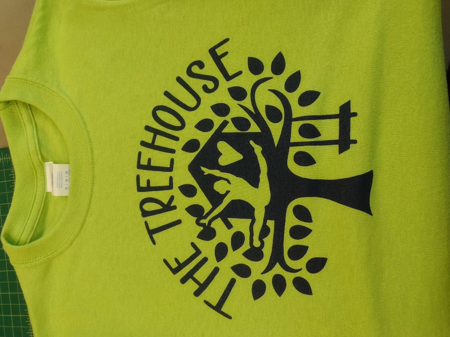 Green t-shirt with black 