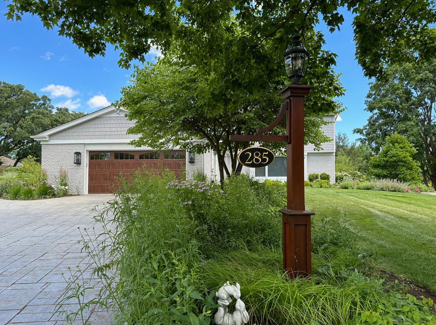 A house with a sign that says 285 on it