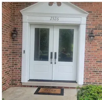 A white door with the number 2323 above it