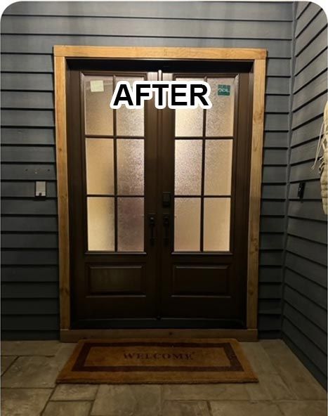 A wooden door with blue siding