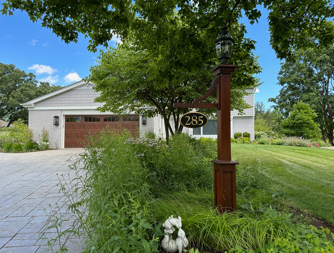 A house with a sign that says 285 on it.