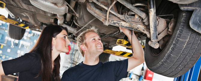 Auto repair man and customer