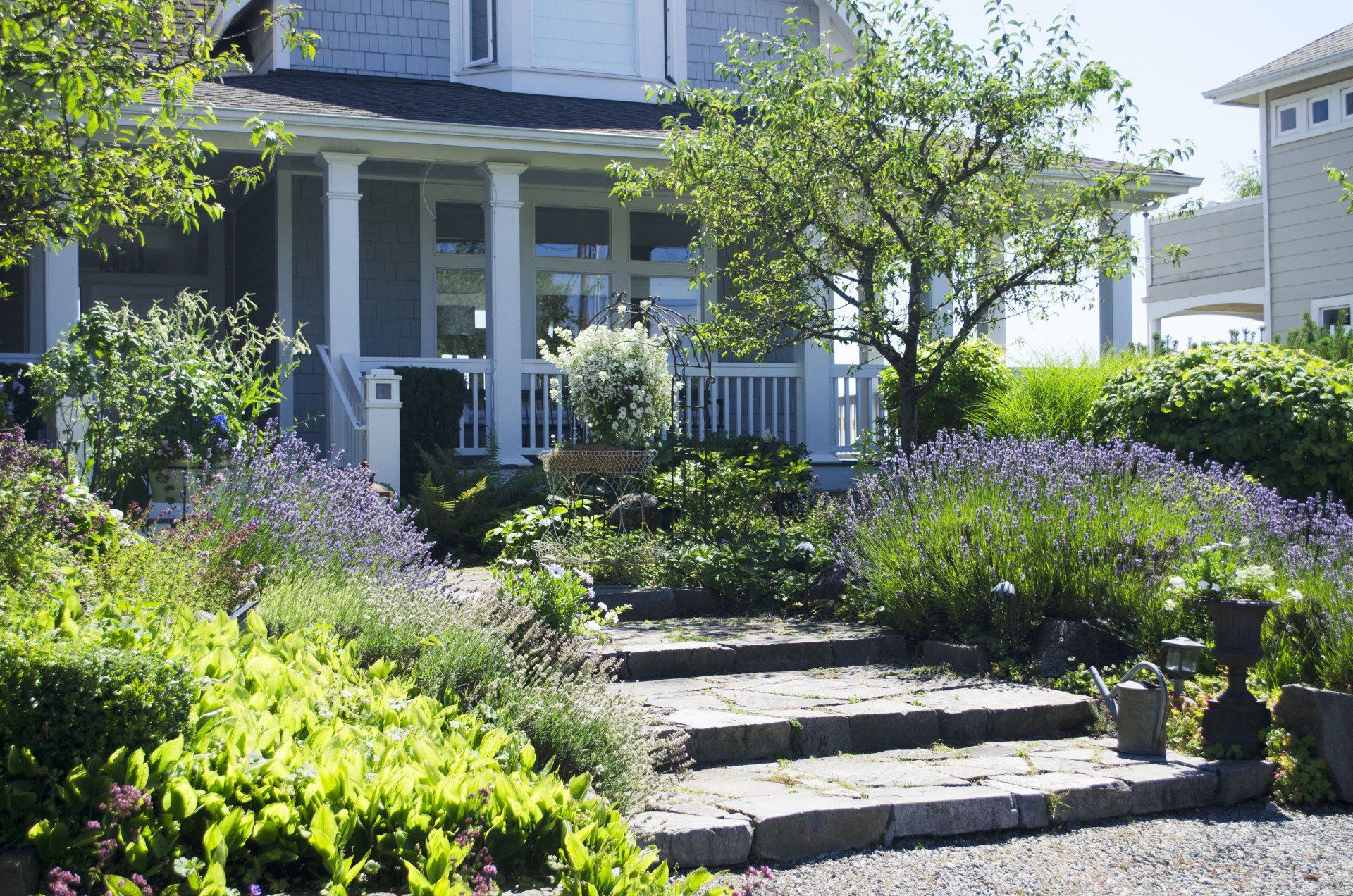 A house with a porch and steps leading up to it