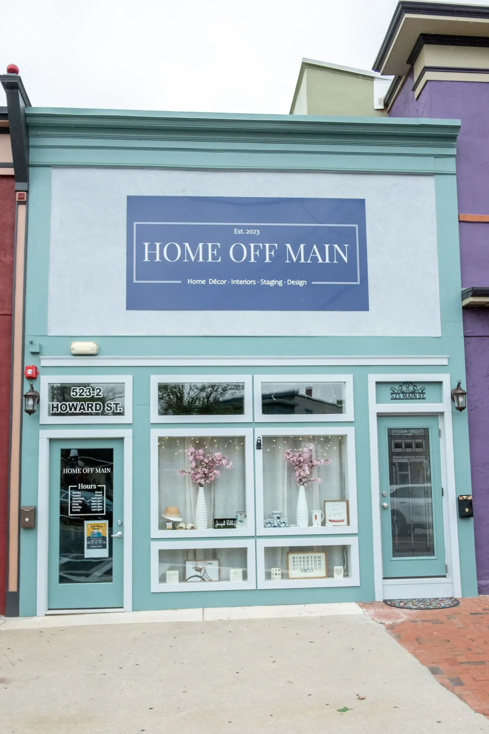 Storefront with blue-green exterior, 