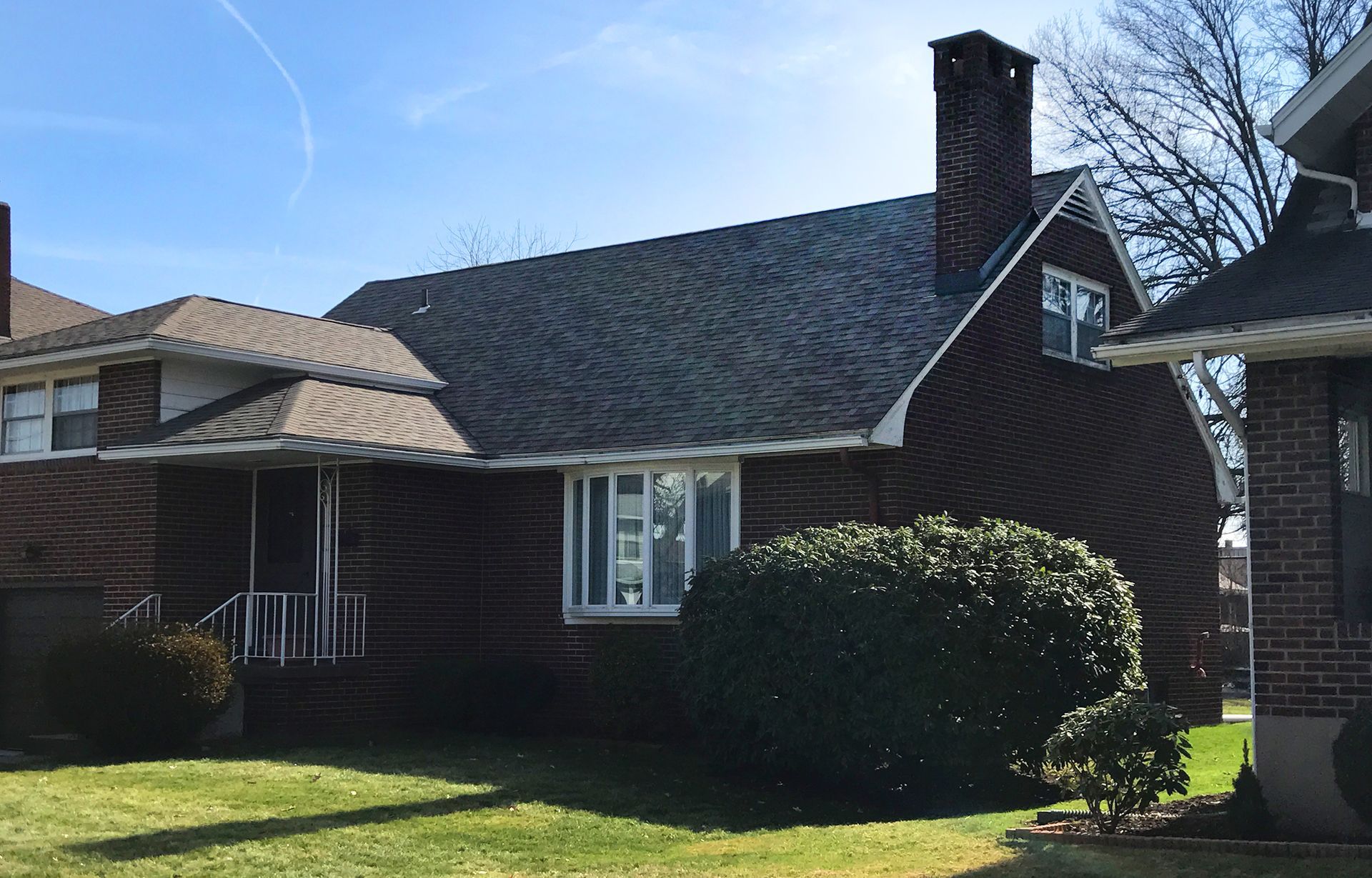 a house with a chimney on the side of it