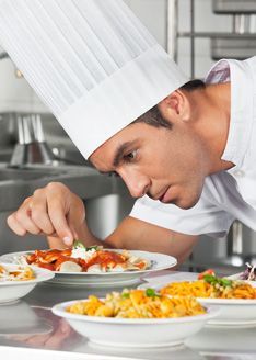 Chef decorating the dish