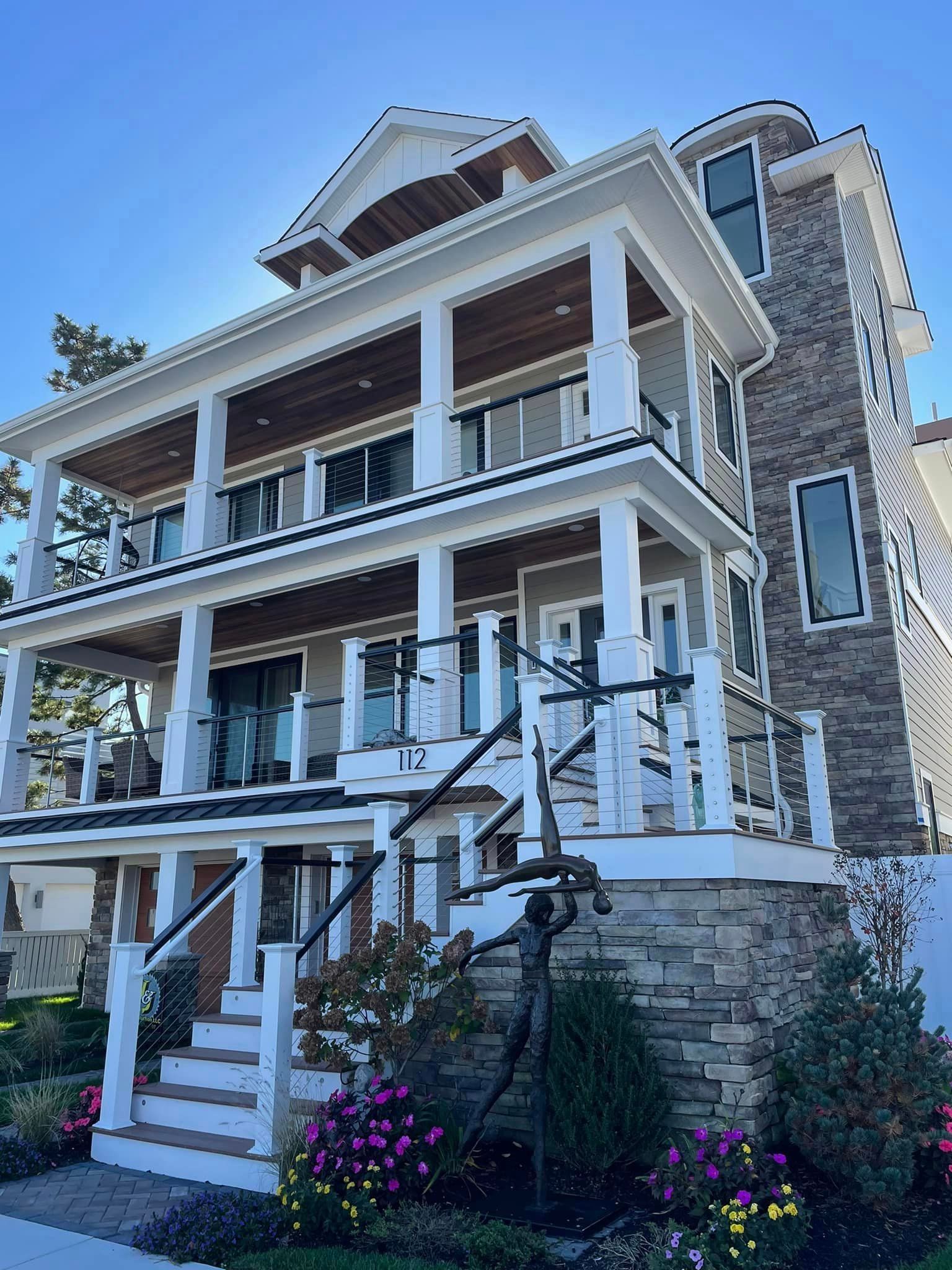 A large house with a lot of windows and balconies