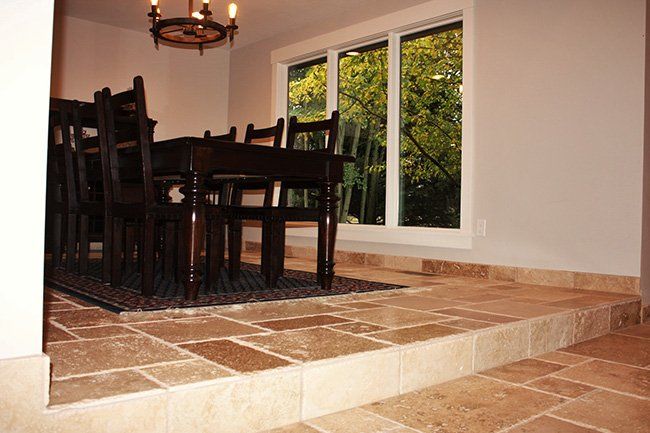 Dining area tile floor design