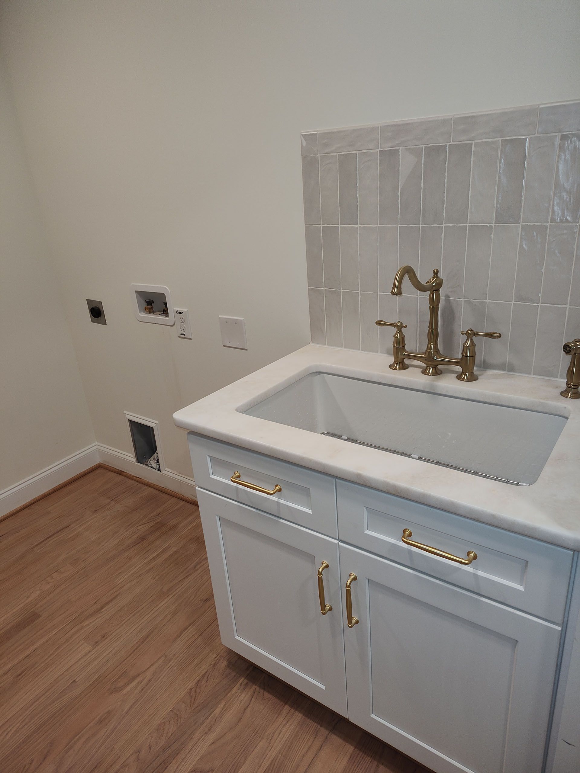 There is a sink in the middle of the room.