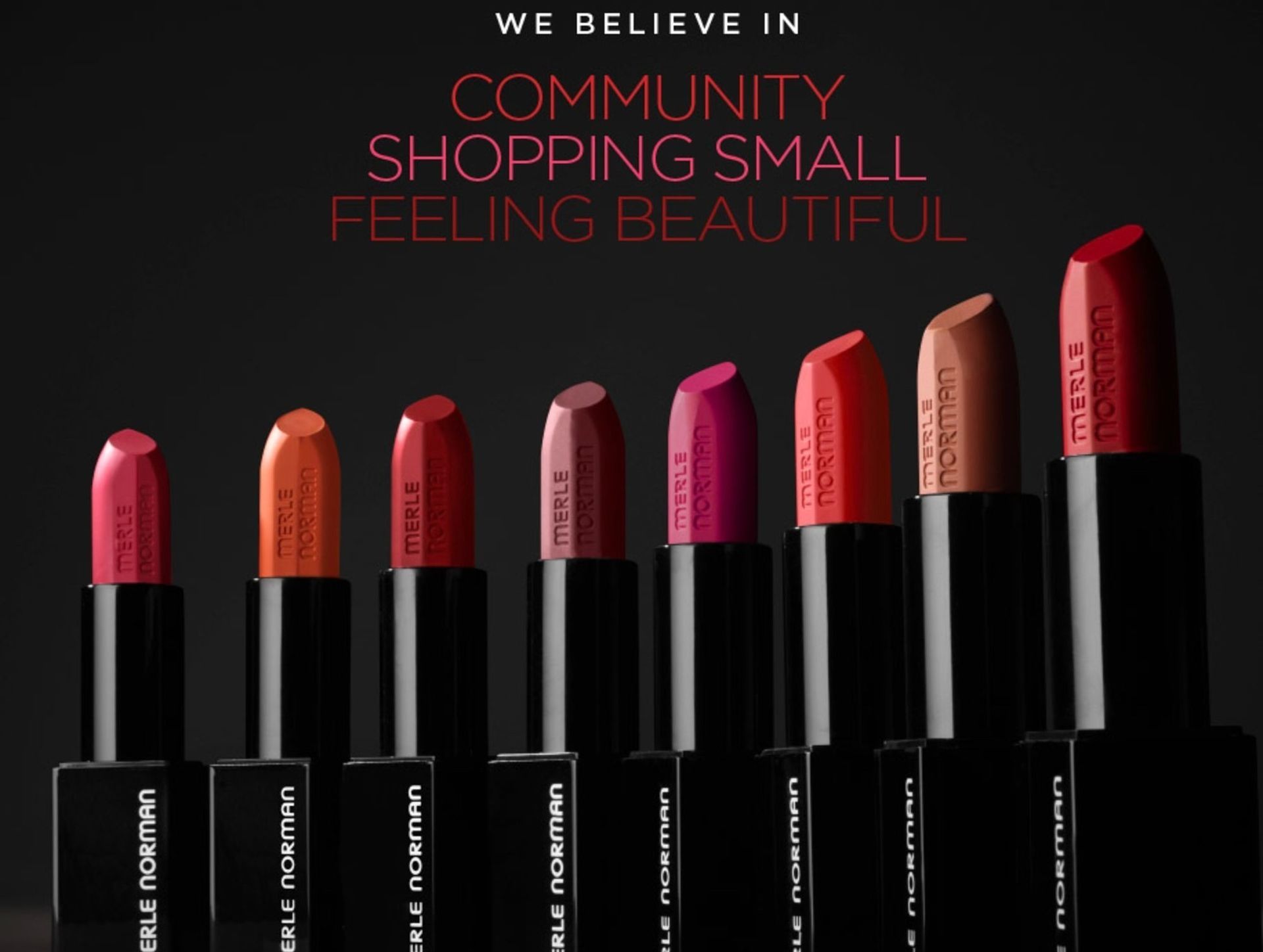 Eight Merle Norman lipsticks in various shades arranged in a row against a black background with text above