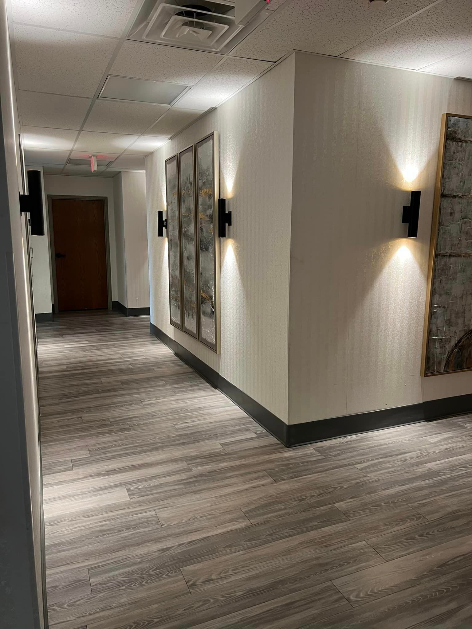 A spacious hallway extending through the interior of the building