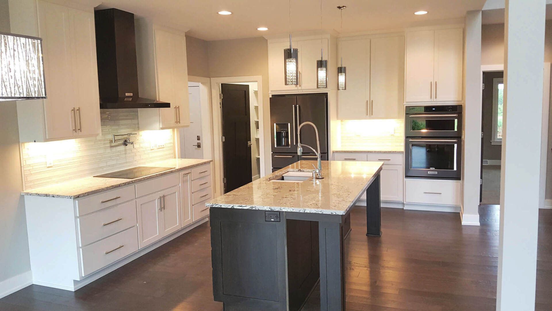 Modern kitchen with stained cabinets