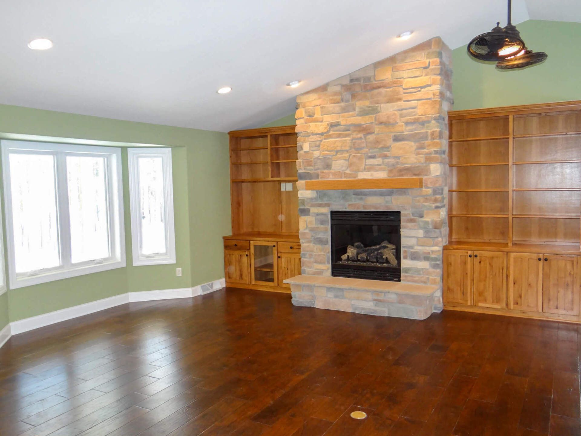Beautiful living room interior with hardwood floors and fireplace