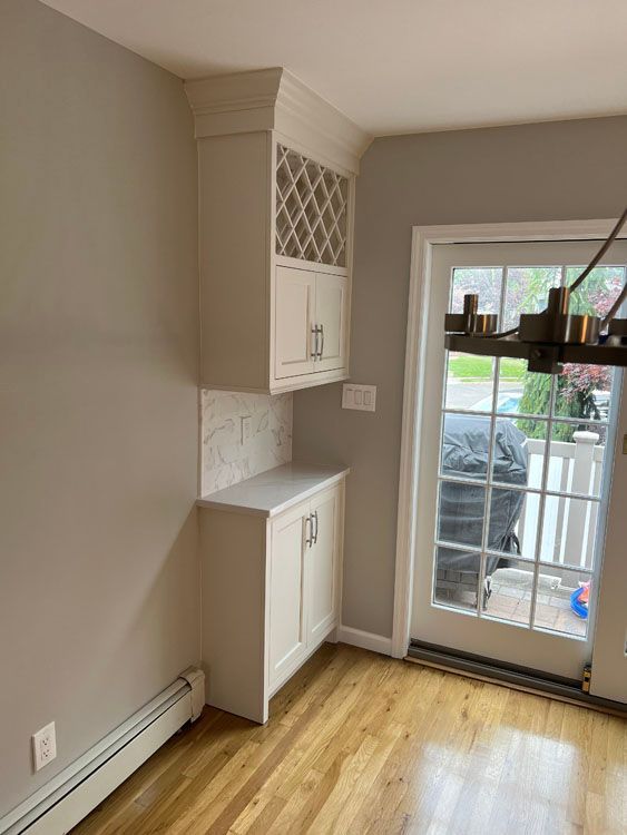 a dining room with hardwood floors 