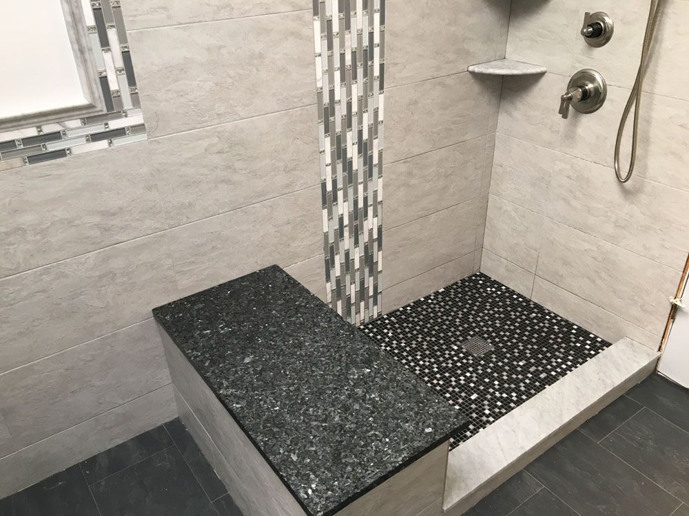 a bathroom with a walk-in shower 