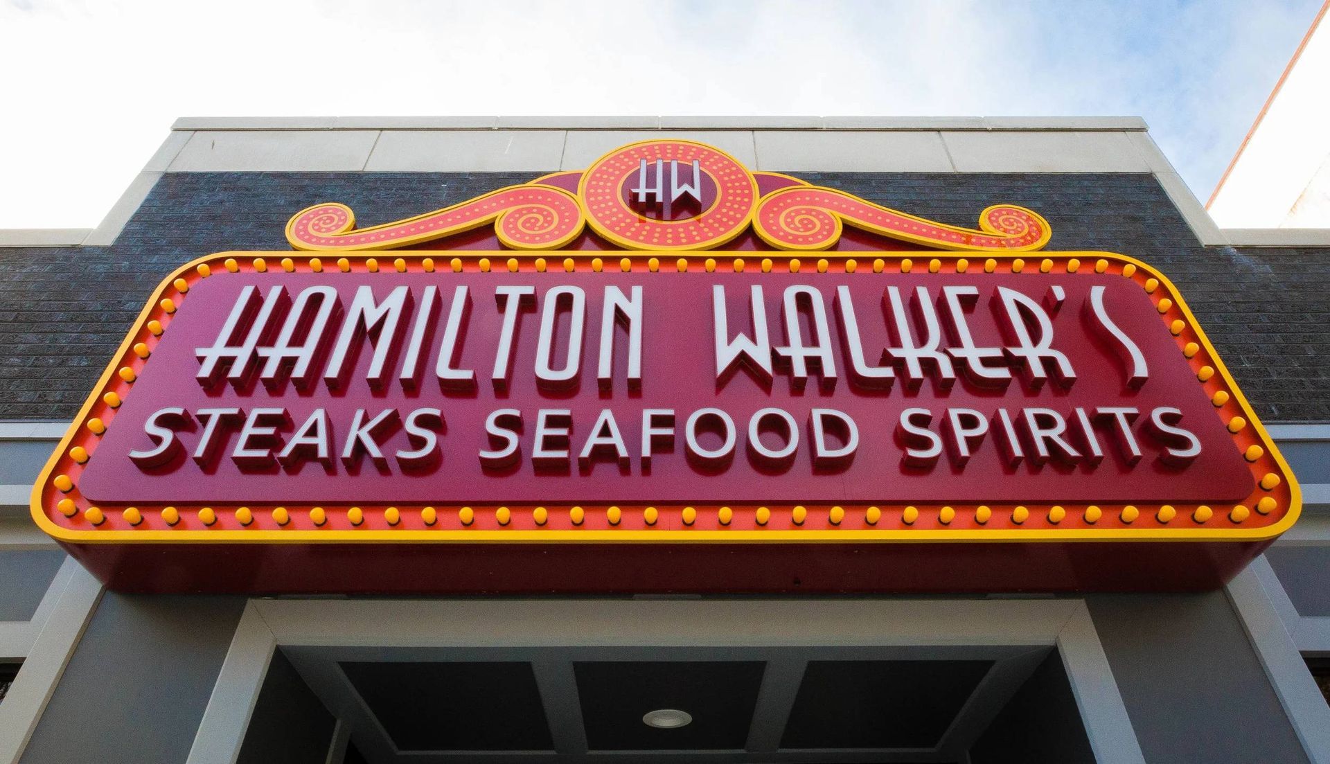 Hamilton Walker's restaurant sign in red and gold, reading 