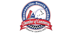 Logo for Mooresville-South Iredell Chamber of Commerce in North Carolina, featuring a boat and landforms inside a blue circle.
