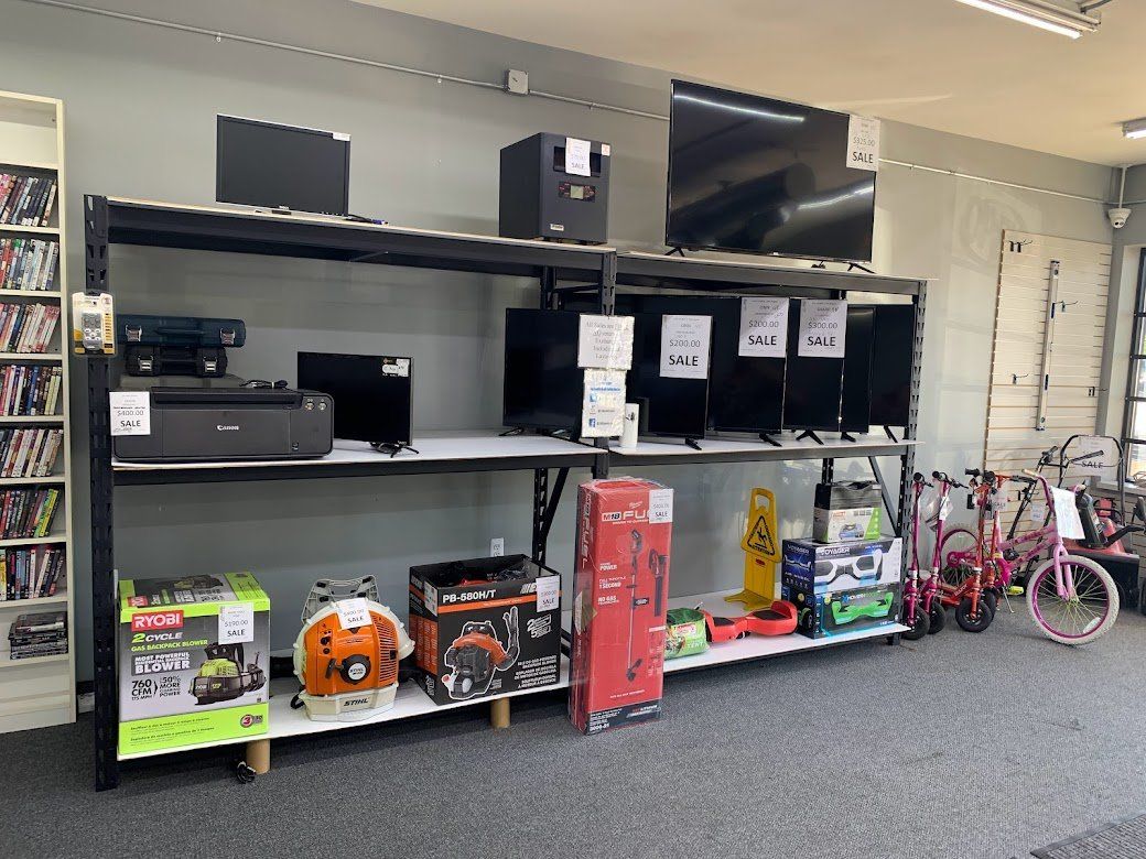 A store filled with lots of electronics and bicycles.