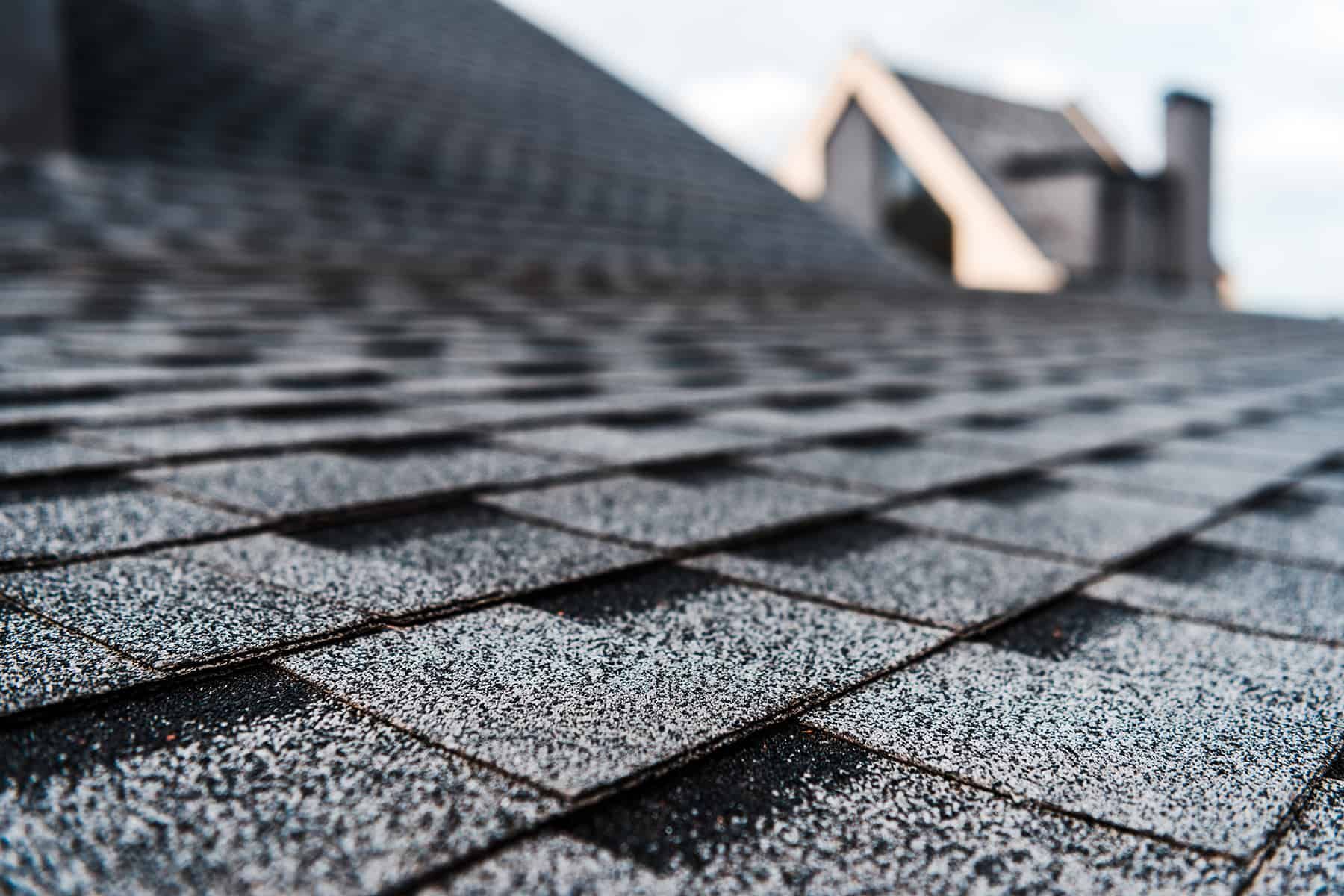 a close up of a roof with shingles on it