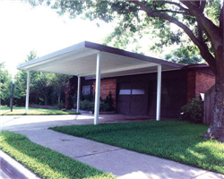 A house with a carport in front of it