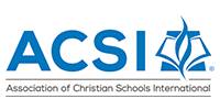 Logo for Association of Christian Schools International: blue text