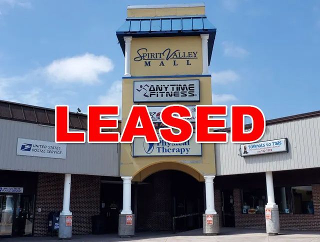 A very tall building with a sign that says supermax