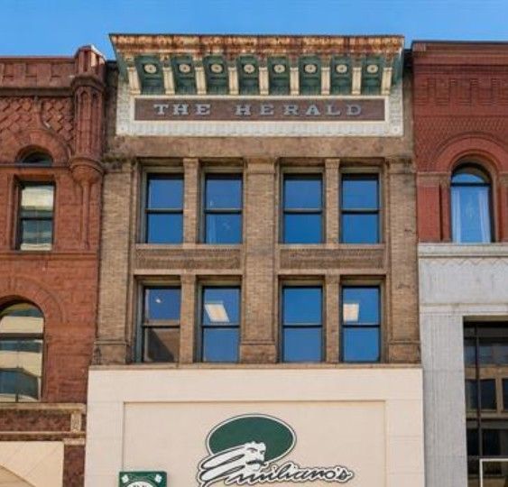 Historic downtown storefronts with red brick facades