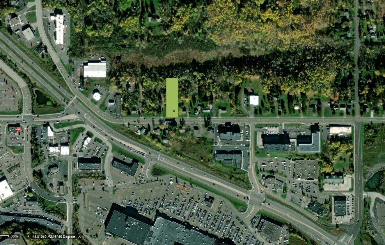 An aerial view of 1633 Maple Grove RdDuluth, MN 55811 with a green building in the middle