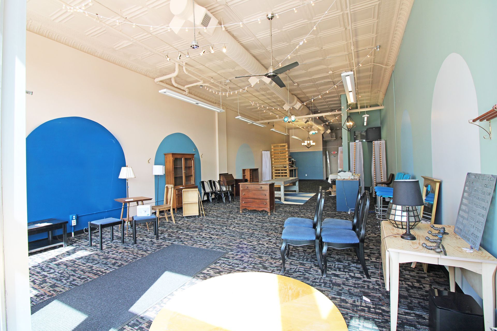 a large room with a lot of furniture in it